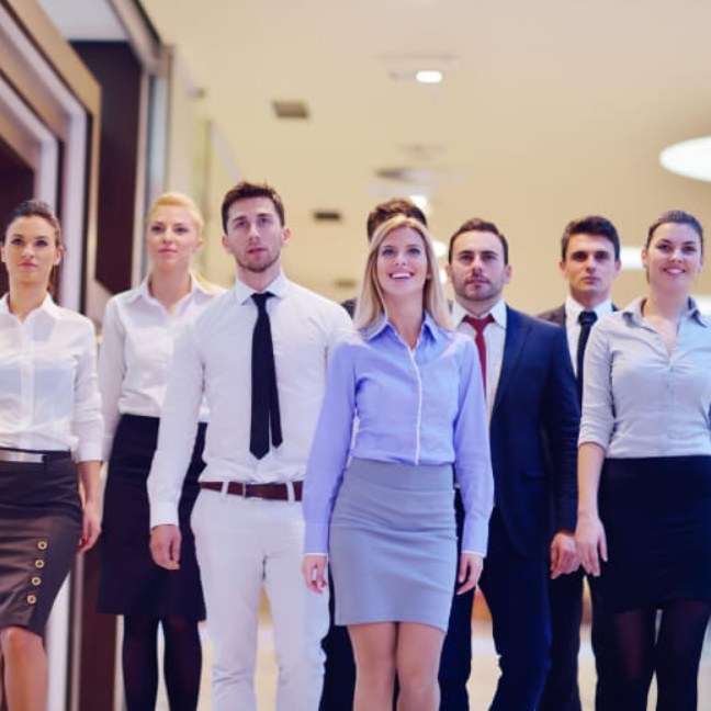 Team of business professionals walking together